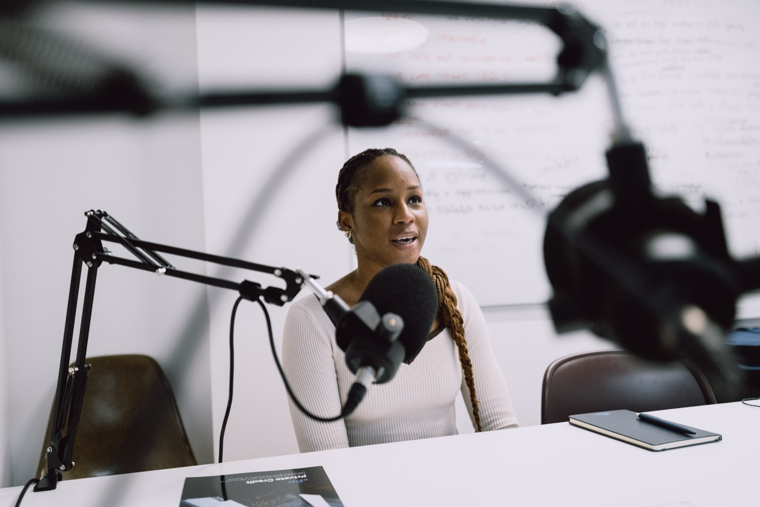 Speaker recording a podcast session at a company event, London