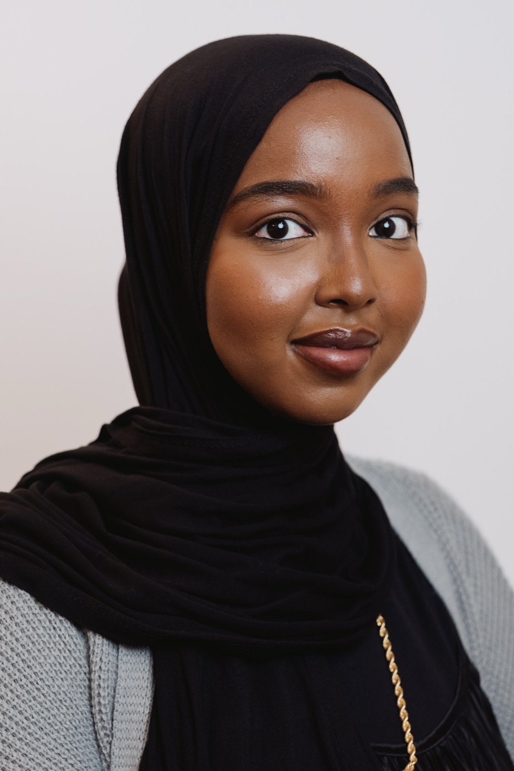 Corporate headshot session — team member against a neutral backdrop, London